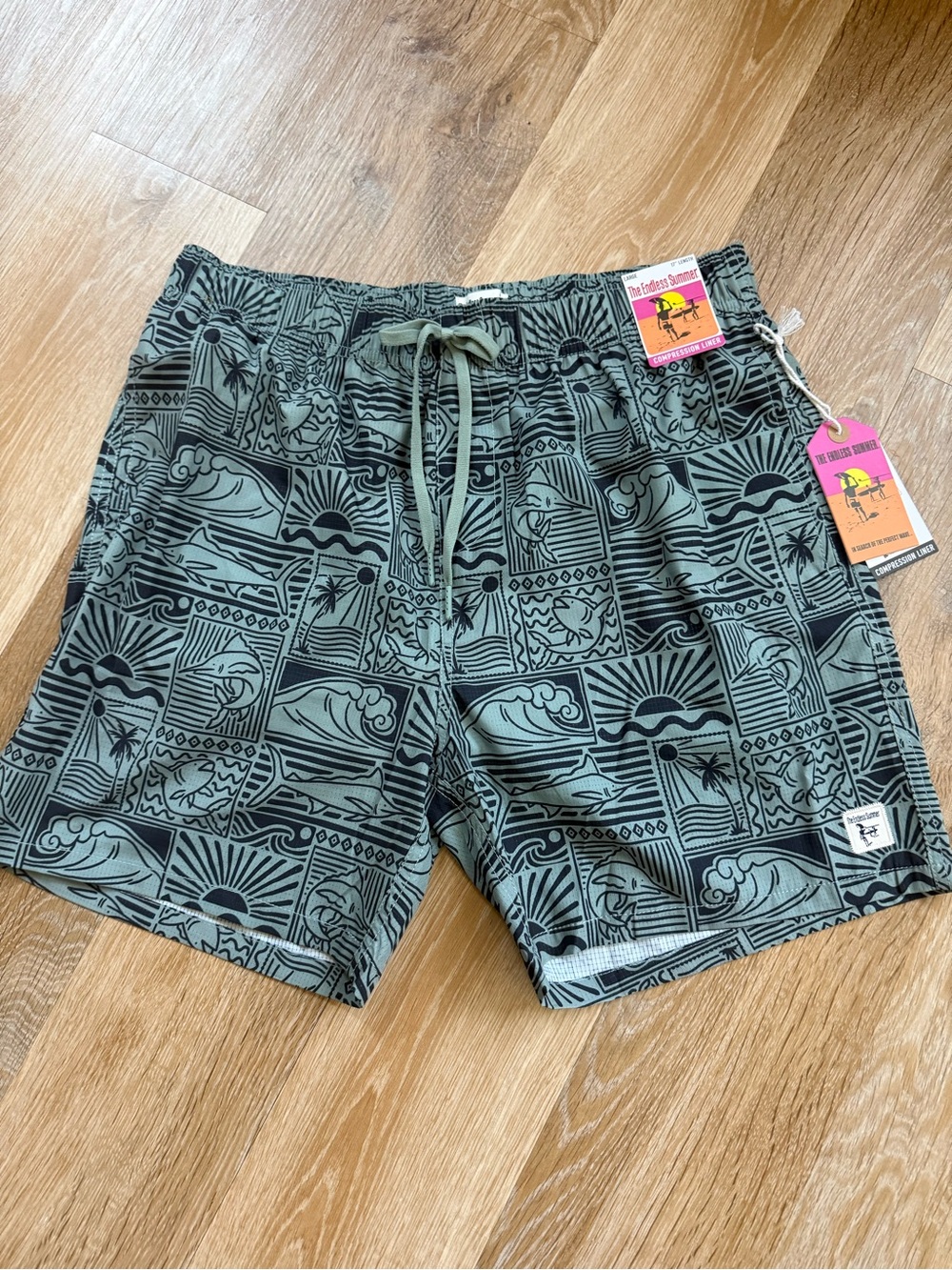Men's Green Patterned Swim Trunks with Black Print